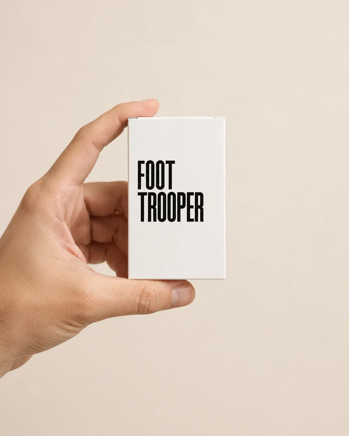 Foot Trooper — the package held in a hand