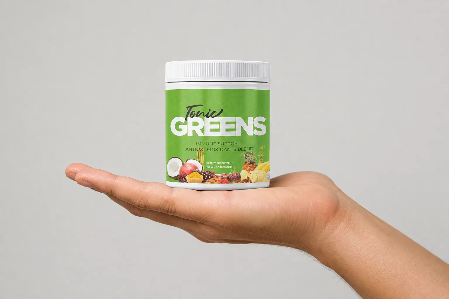 TonicGreens — the package held in a hand