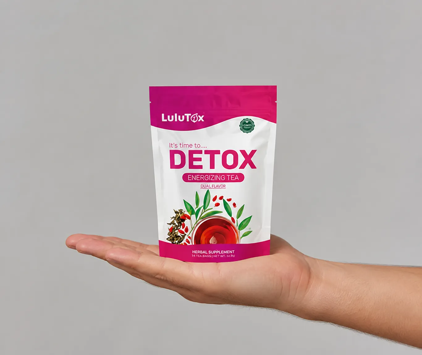 Lulutox Detox Tea — the package held in a hand