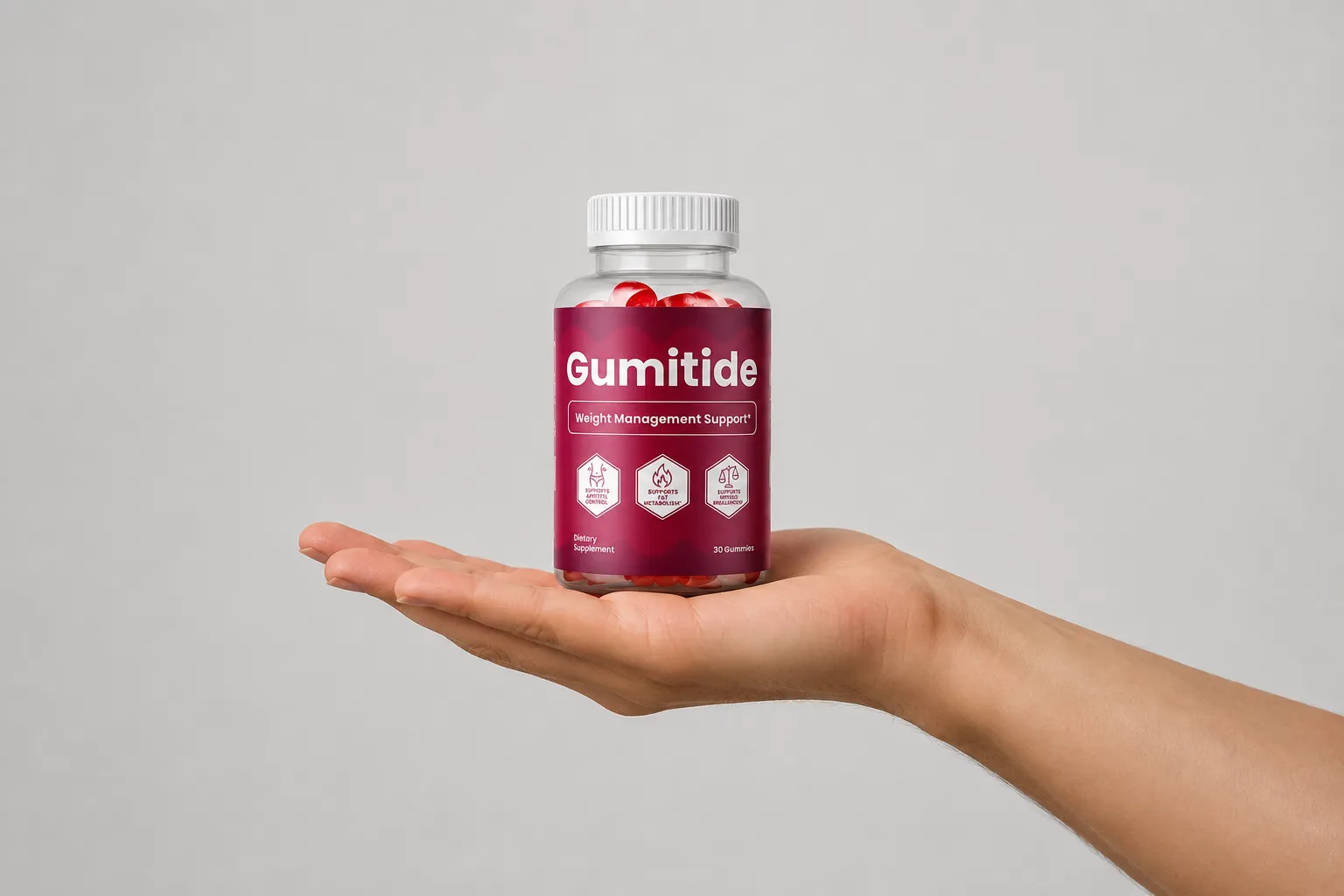 Gumitide — the package held in a hand